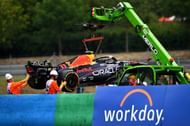 Sergio Perez's RB19 being cleared off the track after crashing, FP1, 2023 Hungarian GP (Photo by Dan Mullan/Getty Images)